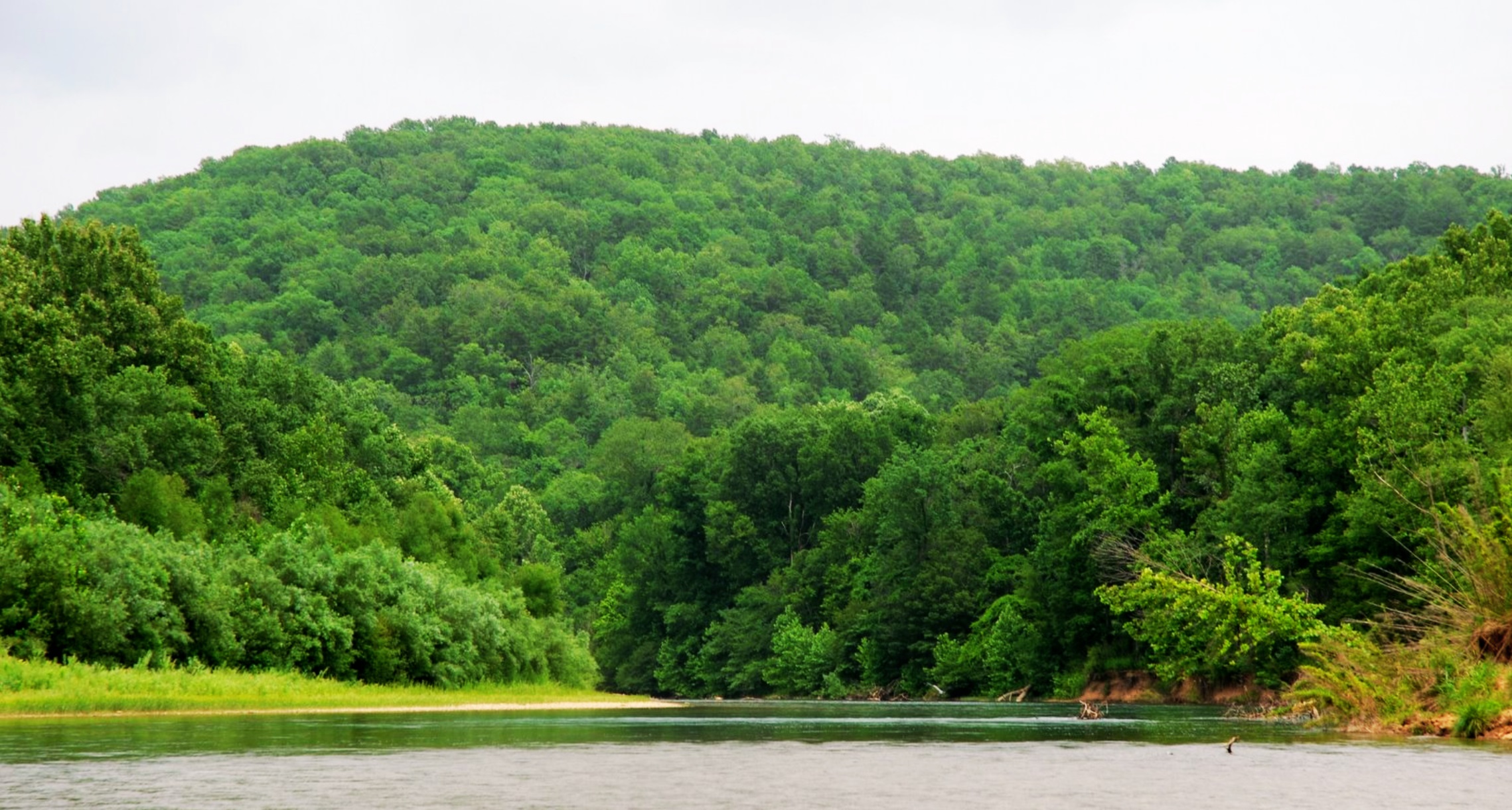 Current River in Ripley County Missouri with Ozark mountain terrain and live-water frontage